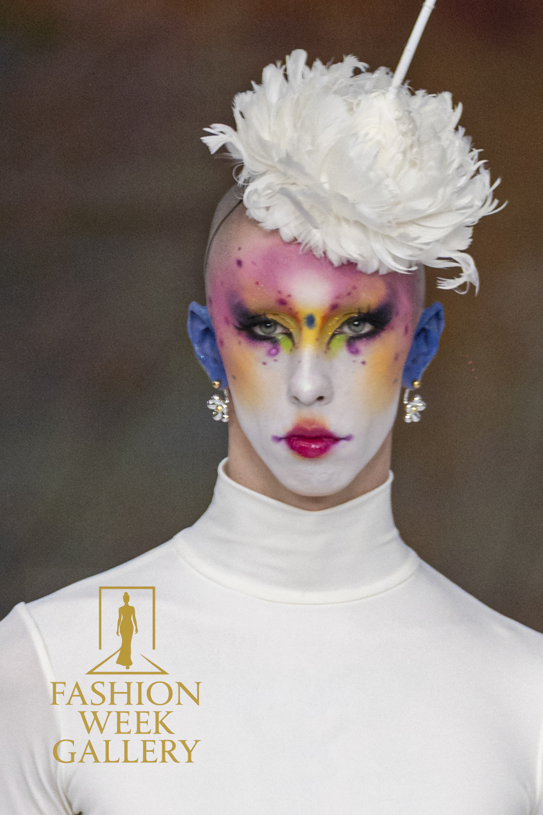 Mariano Moreno, Model walking down the catwalk during a fashion show.